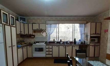 Casa com 5 quartos à venda na Rua Libia Cruz, 343, Estreito, Florianópolis, 300 m2 por R$ 900.000
