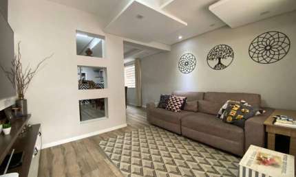 Sobrado com 3 dormitórios à venda, 110 m² por R$ 629.000,00 - Centro - Matinhos/PR