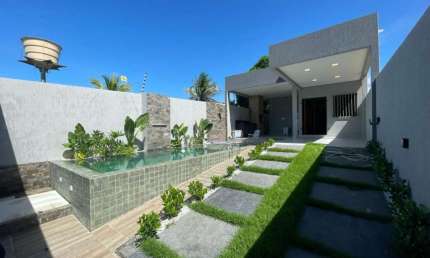 Casa com 3 dormitórios à venda, 140 m² por R$ 570.000 - Carapibus - Conde/PB