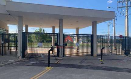 Terreno em condomínio fechado, 300 m², liberado para construir.