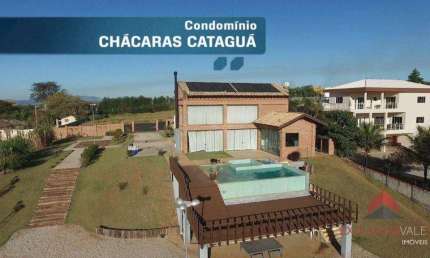 Casa com 3 dormitórios, 700 m² - venda por R$ 3.950.000,00 ou aluguel por R$ 18.592,00/mês - Chácaras Cataguá - Taubaté/SP