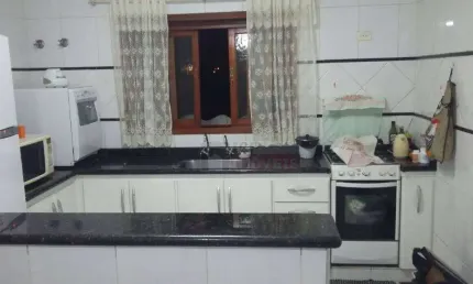 Sobrado com 2 dormitórios à venda, 233 m² por R$ 550.000,00 - Parque Novo Mundo - Americana/SP