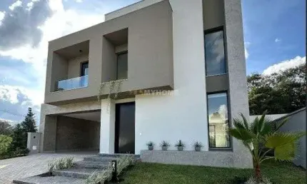 Casa em condomínio no barigui com 4 suítes e 4 vagas