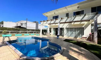 Casa em condomínio fechado com 4 quartos à venda na avenida rodesindo pavan, 7201, praia do estaleiro, balneário camboriú, 452 m2 por r$ 7.300.000