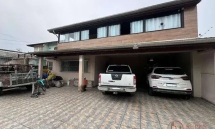 Sobrado com 3 dormitórios à venda, 340 m² por R$ 950.000 - Jardim Indaiá - Bertioga/SP
