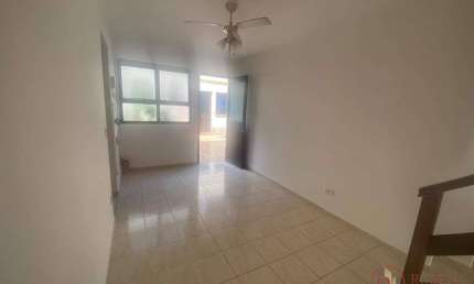 Village com 2 dormitórios à venda, 61 m² por R$ 370.000,00 - Centro - Bertioga/SP
