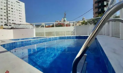Apartamento com 2 dormitórios à venda, 56 m² por r$ 395.000,00 - mirim - praia grande/sp