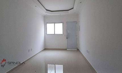 Casa com 2 dormitórios à venda, 60 m² por R$ 340.000,00 - tude basto - Praia Grande/SP