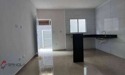 Casa com 2 dormitórios à venda, 70 m² por R$ 450.000,00 - tude basto - Praia Grande/SP