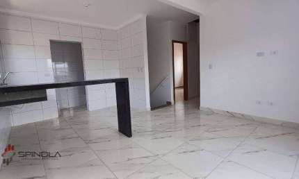 Casa com 2 dormitórios à venda, 70 m² por R$ 550.000,00 - tude basto - Praia Grande/SP