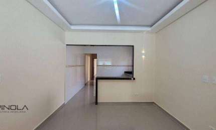 Casa com 2 dormitórios à venda, 110 m² por R$ 585.000,00 - Maracanã - Praia Grande/SP