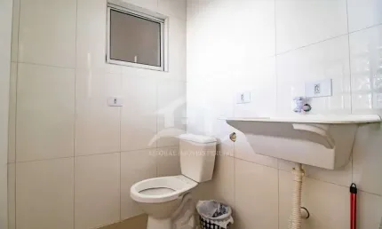 Casa Sobreposta / baixo à venda , 2 quarto(s),  sendo 1 suíte(s)  no bairro Maria Helena Novaes, 400 metros da praia, Peruíbe-SP