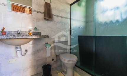 Casa Térrea à venda com piscina, 3 quarto(s),  sendo 2 suíte(s)  no bairro Jardim Márcia, 600 metros da praia, Peruíbe-SP