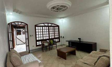 Sobrado com 3 dormitórios à venda, 147 m² por R$ 650.000 - Tupi - Praia Grande/SP