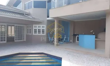 Casa com 3 dormitórios à venda, 400 m² por R$ 2.975.000,00 - Condomínio Moinho de Vento - Valinhos/SP