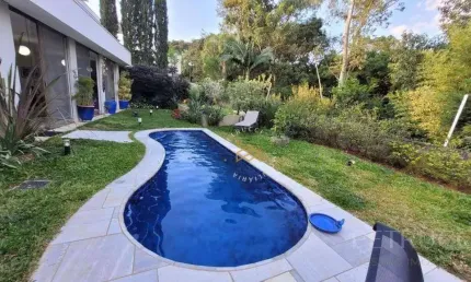Casa com 4 dormitórios à venda, 326 m² por R$ 3.750.000,00 - Condomínio Reserva das Palmeiras - Valinhos/SP