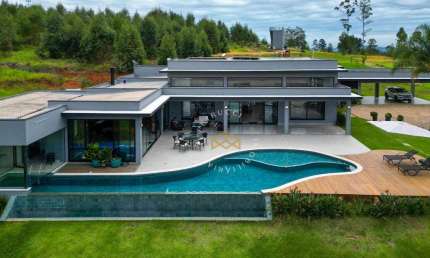 Casa com 5 dormitórios à venda, 703 m² por R$ 5.999.000,00 - Condomínio Fazenda Iracema - Campinas/SP