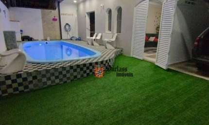 Casa com 4 dormitórios à venda, 150 m² por R$ 750.000,00 - Balneário Guarujá - Guarujá/SP