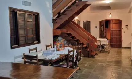 Sobrado com 4 suítes à venda, 215 m² por R$ 950.000 - Massaguaçu - Caraguatatuba/SP