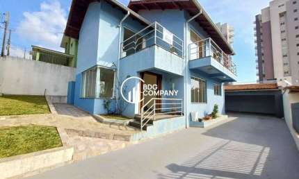 Sobrado com 3 dormitórios à venda, 195 m² por R$ 780.000,00 - Alto da Glória - Irati/PR
