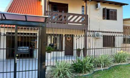 Casa com 4 quartos à venda na Rua Inglaterra, 927, Petrópolis, Novo Hamburgo por R$ 780.000