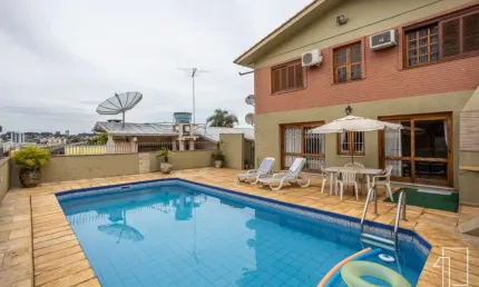 Casa com 4 quartos à venda na Rua Três de Outubro, 172, Pátria Nova, Novo Hamburgo por R$ 809.000