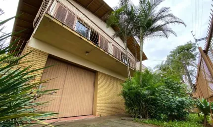 Casa com 3 quartos à venda na Camaquã, 121, Primavera, Novo Hamburgo por R$ 477.000