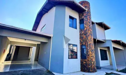 Casa com 3 dormitórios à venda, 204 m² por R$ 990.000 - Centro - Navegantes/SC