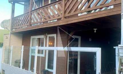 Casa com 3 dormitórios à venda, 128 m² por R$ 425.000 - Centro - Navegantes/SC