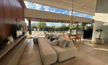 Casa à venda em Londrina no Condomínio Terras de Canãa com 4 suítes e 395.74 m²