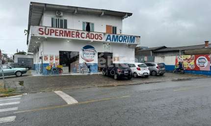 Venda de ponto comercial de mercado  ótima localização e estrutura