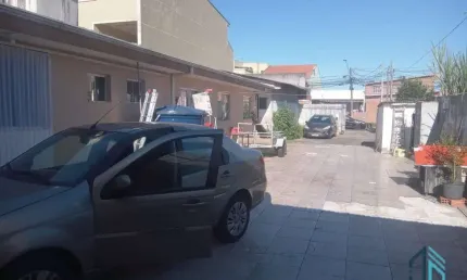 Casa a venda c/ loja no mesmo terreno a venda no Uberaba em Curitiba Pr
