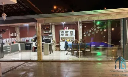 Casa em Condomínio a venda, 04 quartos sendo duas suítes, piscina em Cajati SP