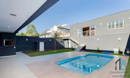 Casa MOBILIADA 100%, 03 suítes, Piscina aquecida, 11 vagas, no Uberaba em Curitiba PR