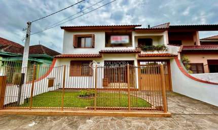 Casa com 3 quartos à venda na Beco Rui Barbosa, 469, Fátima, Canoas, 196 m2 por R$ 940.000