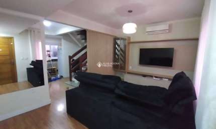 Casa com 3 quartos à venda na Avenida Armando Fajardo, 2823, Igara, Canoas, 100 m2 por R$ 690.000