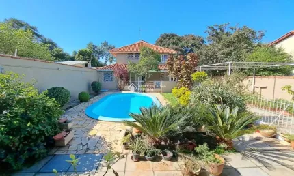 Casa com 4 quartos à venda na Rua das Pitangueiras, 164, Harmonia, Canoas, 153 m2 por R$ 870.000