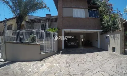Casa em condomínio fechado com 4 quartos à venda na Rua Sepé Tiaraju, 105, Centro, Canoas, 244 m2 por R$ 990.000