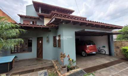 Casa em condomínio fechado com 4 quartos à venda na Rua Nazaré, 48, Nossa Senhora das Graças, Canoas, 232 m2 por R$ 1.200.000
