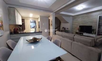 Casa em condomínio fechado com 3 quartos à venda na Avenida Açucena, 650, Estância Velha, Canoas, 156 m2 por R$ 1.060.000