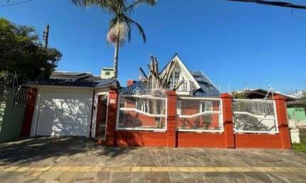 Casa com 2 quartos à venda na Rua João Aluysio Jacob, 380, Fátima, Canoas, 150 m2 por R$ 750.000