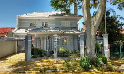 Casa com 4 quartos à venda na Rua Luís Maurício Scolari, 423, Igara, Canoas, 300 m2 por R$ 1.290.000