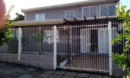 Casa em condomínio fechado com 3 quartos à venda na Rua Tupi, 408, Igara, Canoas, 108 m2 por R$ 499.000