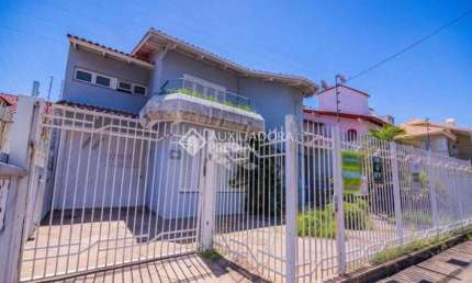 Casa com 3 quartos à venda na Avenida Doutor Sezefredo Azambuja Vieira, 156, Marechal Rondon, Canoas, 438 m2 por R$ 1.840.000