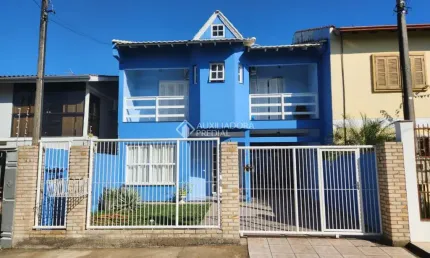 Casa com 4 quartos à venda na Elis Regina, 110, Harmonia, Canoas, 167 m2 por R$ 700.000