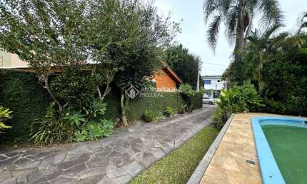 Casa com 3 quartos à venda na Rua Tomé de Souza, 556, Nossa Senhora das Graças, Canoas, 320 m2 por R$ 1.390.000