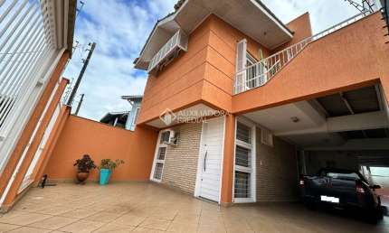 Casa com 4 quartos à venda na Rua Martinho Lutero, 125, Harmonia, Canoas, 178 m2 por R$ 850.000