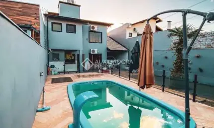 Casa com 3 quartos à venda na Rua João de Azevedo Barbosa Filho, 123, São José, Canoas, 212 m2 por R$ 1.200.000