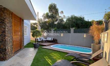 Casa com 3 quartos à venda na Rua das Angélicas, 516, Estância Velha, Canoas, 188 m2 por R$ 1.190.000
