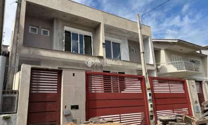 Casa com 3 quartos à venda na Rua Dinamarca, 223, Estância Velha, Canoas, 200 m2 por R$ 1.450.000